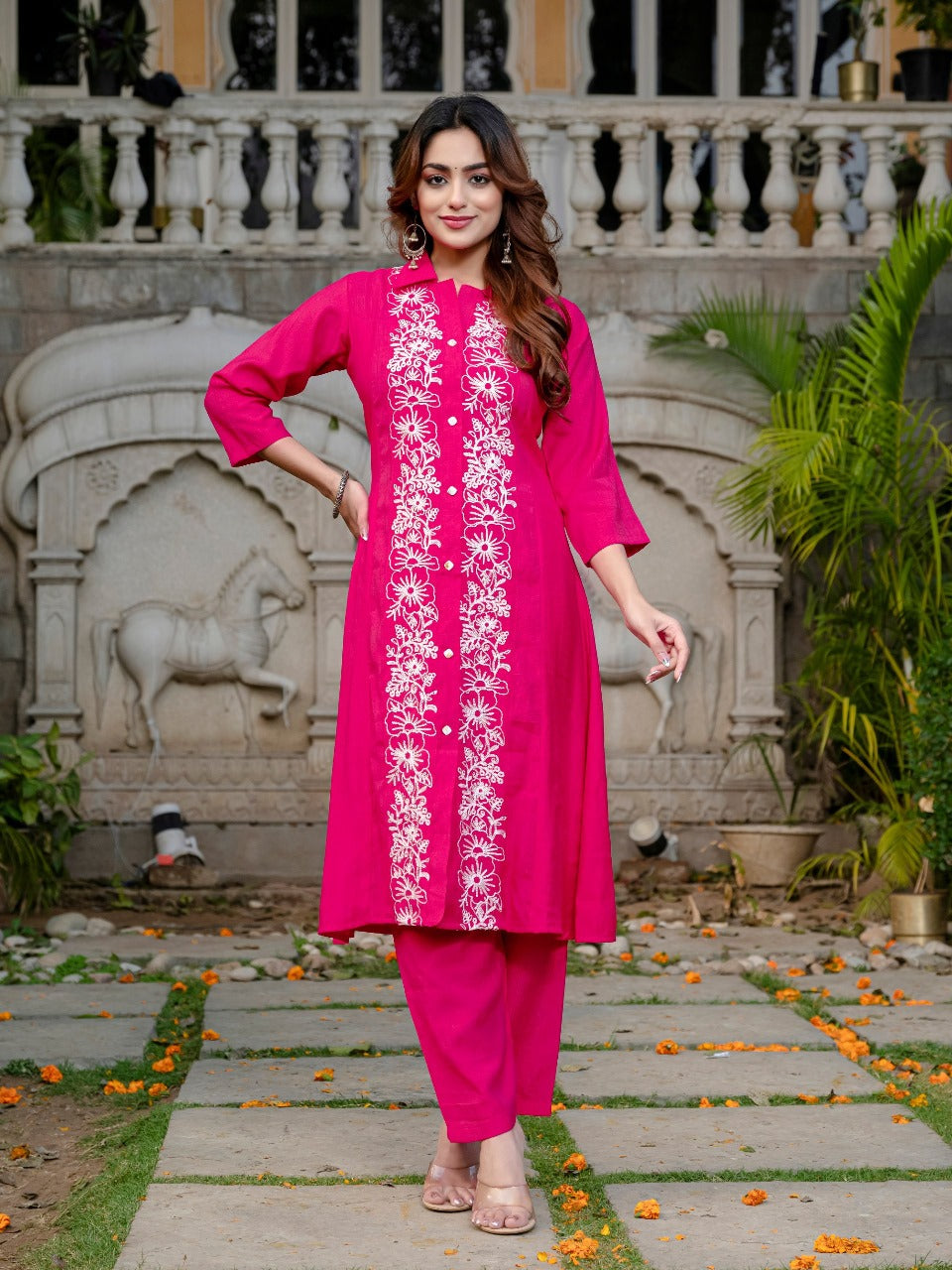 Premium quality in rani color viscose fabric with floral Lucknowi work with Aline top bottom
