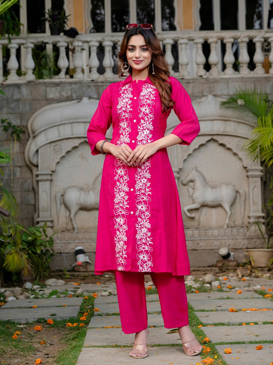 Premium quality in rani color viscose fabric with floral Lucknowi work with Aline top bottom